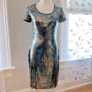 Joseph Ribkoff stunning silver sequined sheath dress. Fully lined. Size 4.